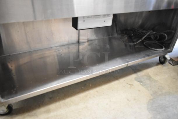 Win Depot WBFHT-500 stainless steel commercial electric steam table with under shelf, 208V, 1 Phase, in good condition.