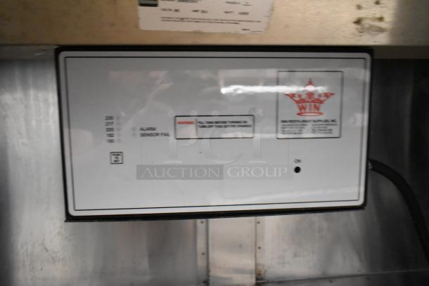 Win Depot WBFHT-500 electric steam table control panel, 208V, 1 Phase, stainless steel, with warning labels and volt indicator.