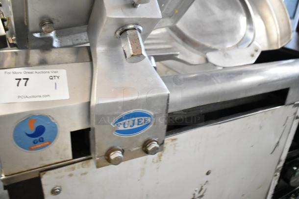 Fujee HFS-350S metal commercial meat slicer, floor style, 220V. Features labels and auction tag. Ideal for heavy-duty use.