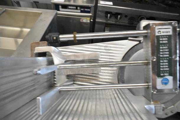 Fujee HFS-350S metal commercial meat slicer, 220V, floor style, features adjustment knobs and a sturdy blade assembly.