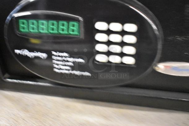 Two black metal single compartment safes, keypad entry, no combinations provided. Auction: 2 times your bid.