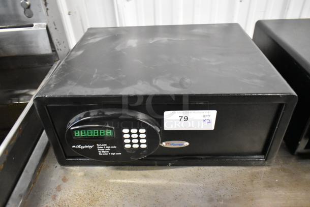 Two black metal single compartment safes, no combinations included, visible keypad, model label reads "nRegistrar."