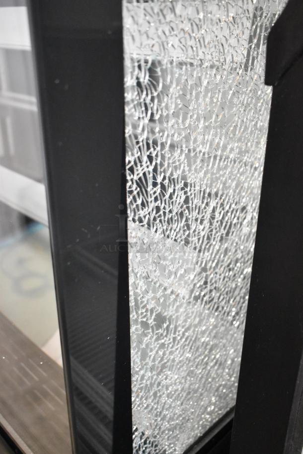 Brand new Avantco 193BCD48B bakery display case, 48" curved glass, black. Notable glass damage shown. 115V, 1 phase.