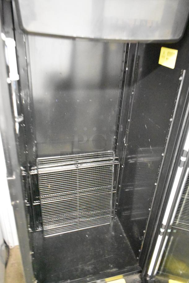 Imbera VR12 commercial cooler, single door, metal, poly-coated racks, 115V, 1 Phase, interior view, used condition.