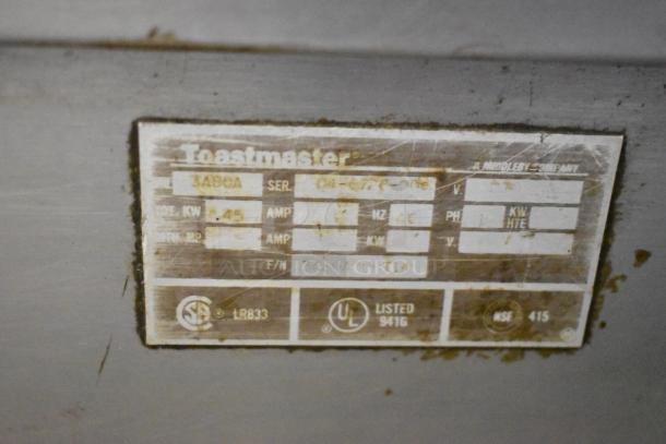 Toastmaster 3ABOA stainless steel commercial warming drawer, model 3ABOA, 115 volts, 1 phase. Label displays model and specs.