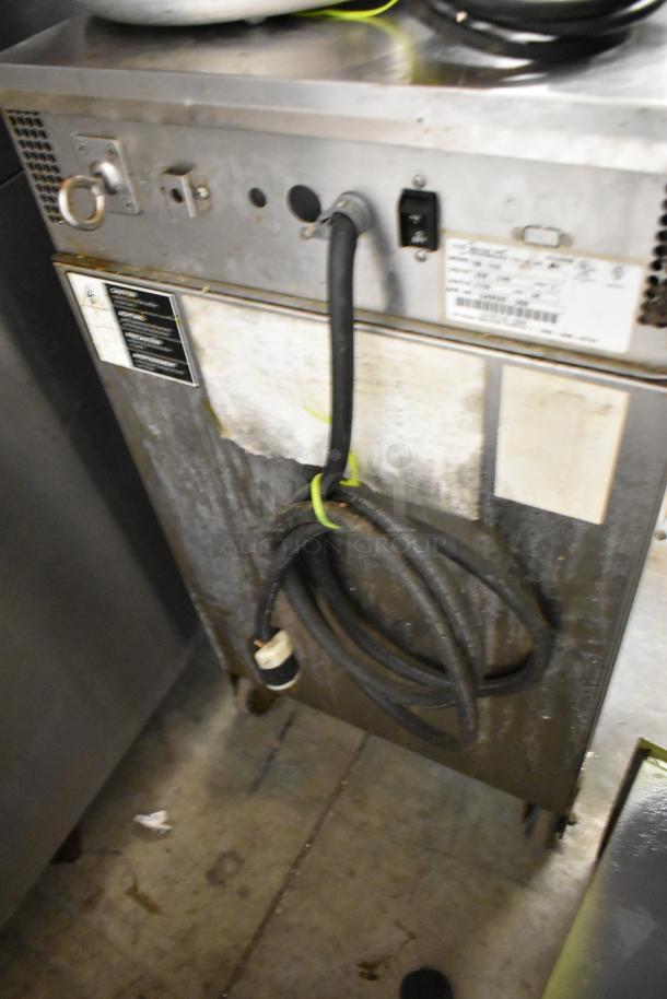 Alto Shaam 500-TH/III Cook N Hold Cabinet, stainless steel, on commercial casters. Visible power cord and labels. 208-240V, 1 Phase.