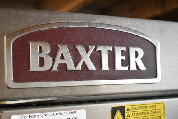 Baxter OV310G stainless steel commercial oven, natural gas-powered, dual pan rack, on casters. Brand logo visible.