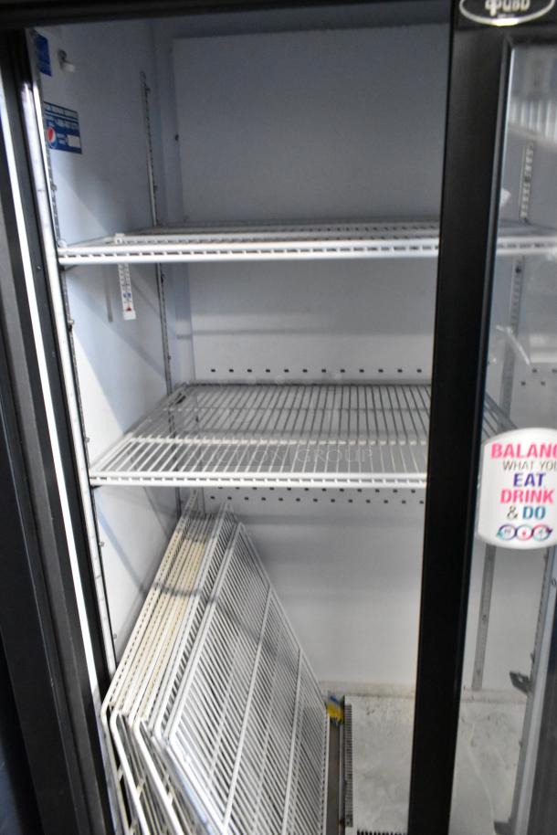QBD CD45-HC metal commercial 2-door reach-in cooler, poly-coated racks, 115 volts, 1 phase, excellent condition.