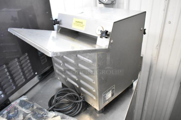 Somerset CDR-100P stainless steel dough sheeter, commercial countertop model, 115 volts, 1 phase, in excellent condition.