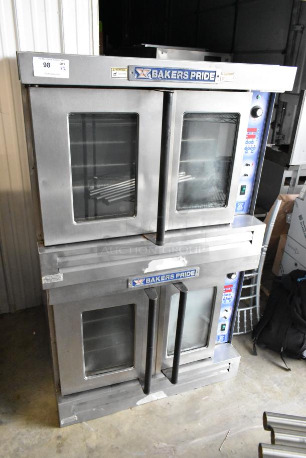 2 Bakers Pride stainless steel convection ovens with view-through doors and thermostatic controls. Includes metal racks.