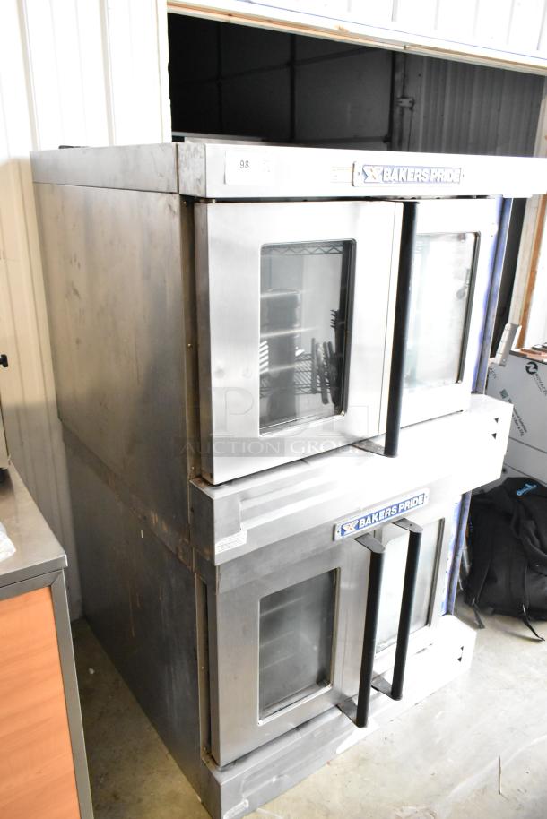 2 Bakers Pride stainless steel commercial gas convection ovens with view-through doors, metal racks, and thermostatic controls.