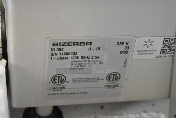 2018 Bizerba GSP H meat slicer label showing model, 120V power info, serial number 11606232, and maintenance tag.