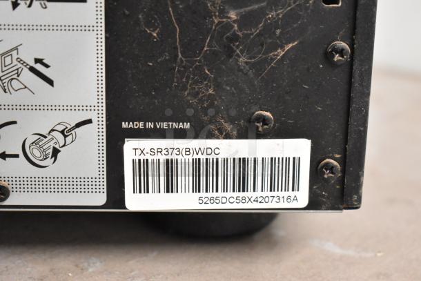 Onkyo AV Receiver model TX-SR373(B)WDC, made in Vietnam, showing label and barcode details.