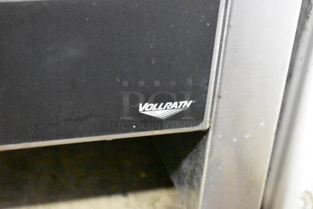 Vollrath JT3H CT4H-220950 stainless steel conveyor toaster oven. Logo visible, commercial use, 220 volts.
