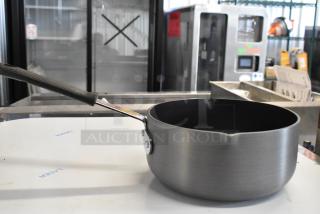 Brand new Thunder Group 922ALSS050AC 5 Qt. anodized non-stick aluminum sauce pan; slight scratches, durable build.