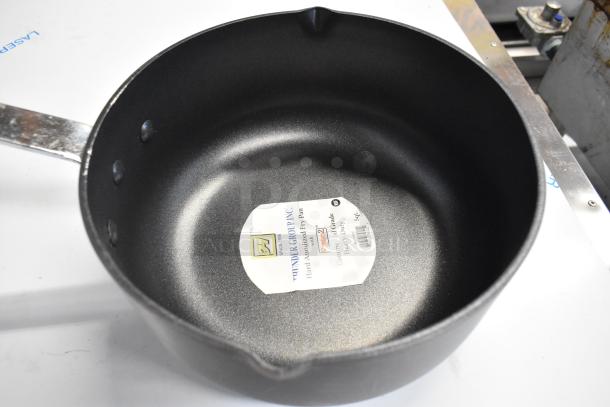 2 new Thunder Group 5 Qt. anodized non-stick aluminum sauce pans, model 922ALSS050AC, with light scratching.