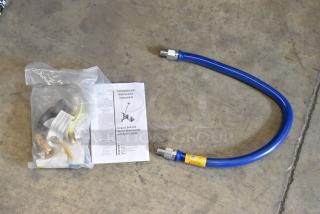Brand new Dormont 1650KIT36 SnapFast 36" gas connector kit, includes two elbows, restraining cable, and instructions.