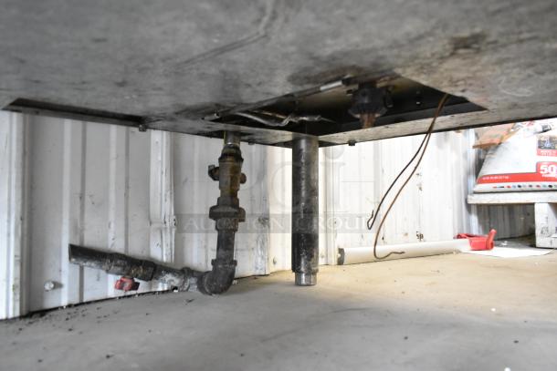 BE&SCO Beta 900 stainless steel tortilla press, natural gas powered, visible plumbing connections and wiring below.