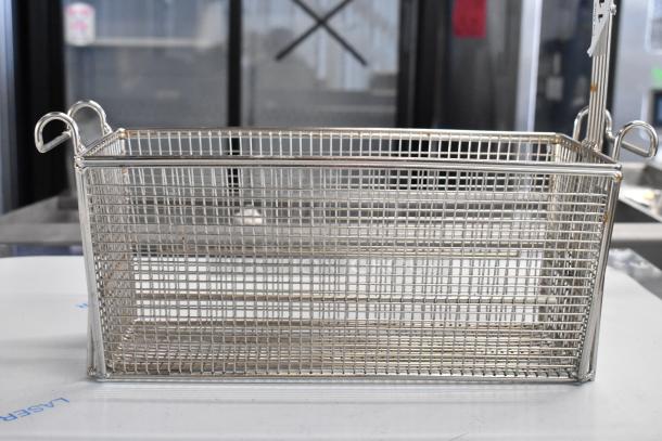 Brand new metal fry basket with minor scratches, featuring sturdy handles and uniform wire mesh design. Ideal for kitchen use.