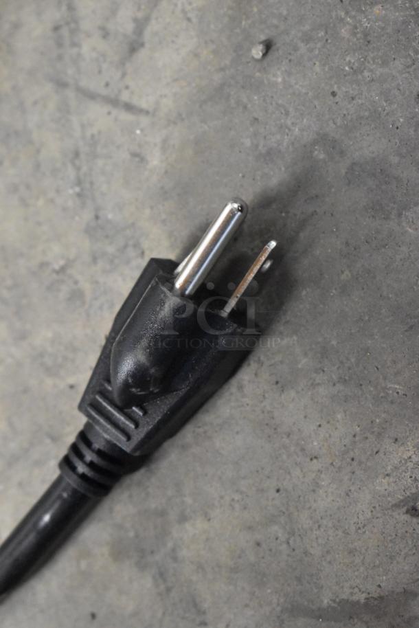 Close-up of a black power plug for the Mahlkonig E65W espresso grinder. Brand new but labeled "scratch and dent."