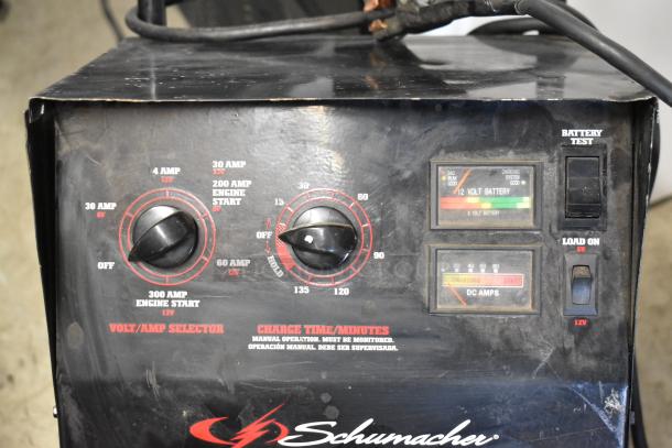 Schumacher SE 8050 Battery Charger, used condition, volt/amp selector, charge time settings, and battery test indicators.