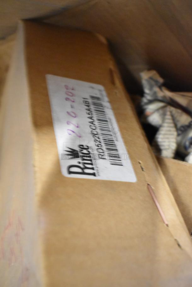 Two boxes containing Prince RD-150-16, Prince RD522CCAA5A4B1 parts. Label visible with brand and model number.
