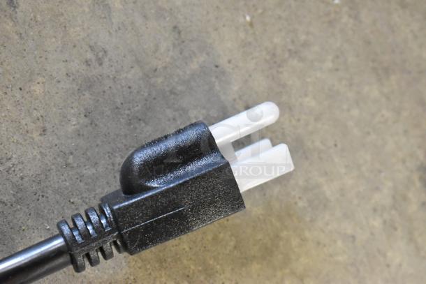 Close-up of the power plug of a Hatco GRAH-60 infrared food warmer, 120 volts, 1 phase, showing minor scratches.