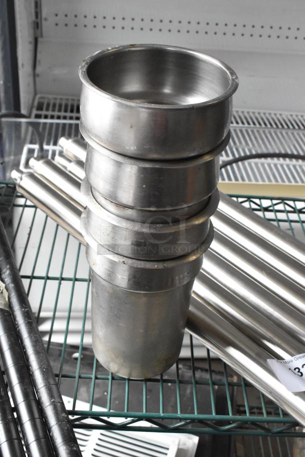 Lot of stainless steel drop-in bins and metal rods on a wire shelf. Items show some wear, indicating prior use.