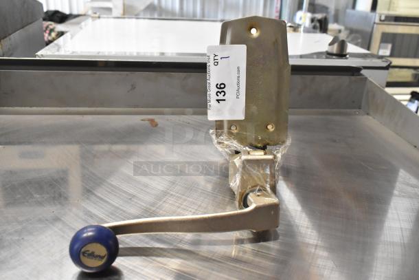BRAND NEW Edlund 905 Metal Commercial Can Opener, scratch and dent, with mount, visible packaging, auction tag "136 QTY 1."