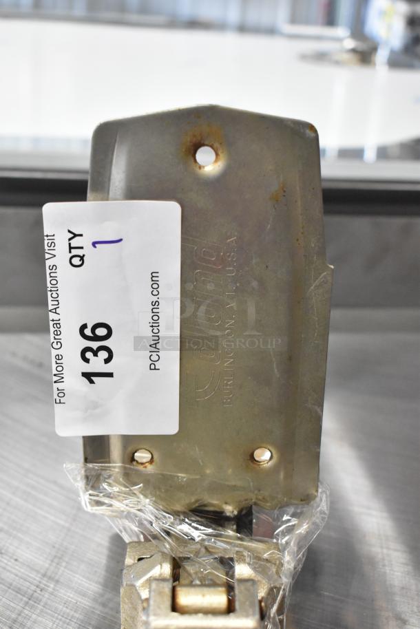 BRAND NEW Edlund 905 Metal Commercial Can Opener with mount, scratch and dent, metal finish, visible auction tag.