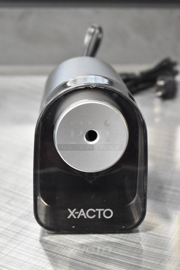 BRAND NEW X-acto 1818XX Countertop Electric Pencil Sharpener, minor scratches, 120V, 1 Phase, front view with X-acto logo.