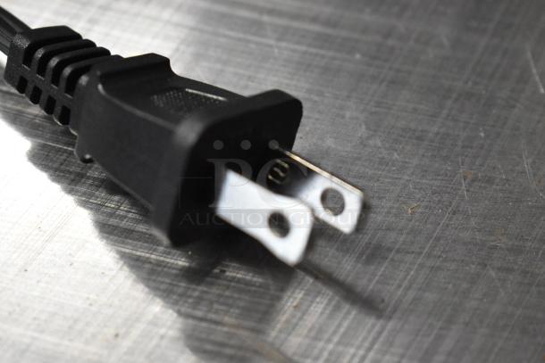 Close-up of a black power plug for ABS07-T Countertop Sandwich Maker, compatible with 120 Volts, 1 Phase.