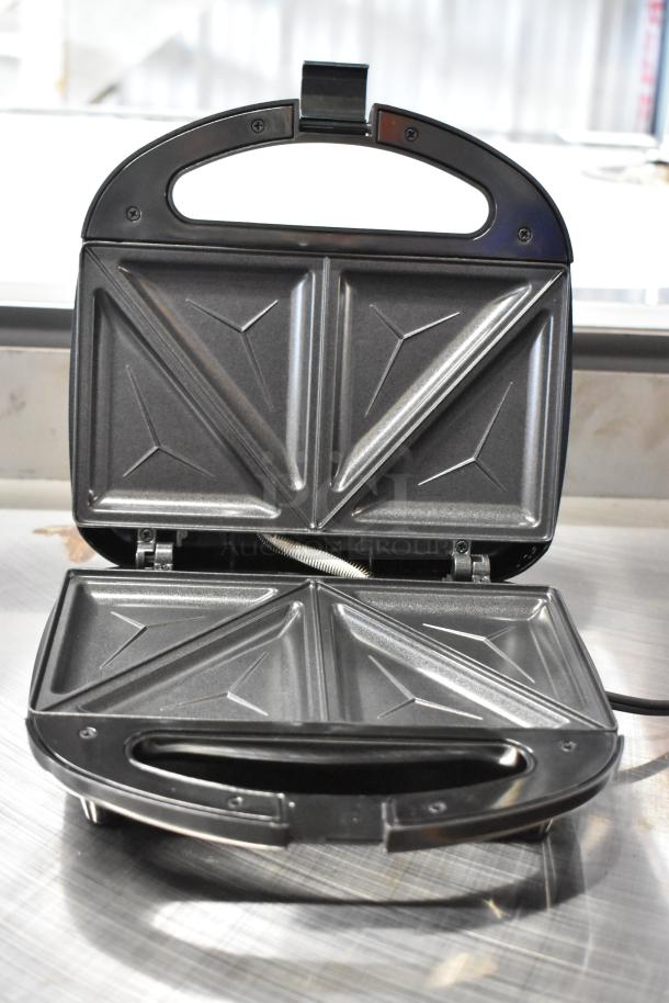 ABS07-T Countertop Sandwich Maker, brand new with minor scratches. 120 Volts, 1 Phase. Auction for 2 units.