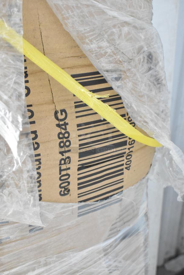 Box with barcode and label for 600TB1884G Regency stainless steel work table, wrapped in plastic and secured with yellow strap.