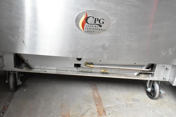 CPG stainless steel commercial gas griddle with oven, overshelf, backsplash, and casters. Visible logo and gas connection.