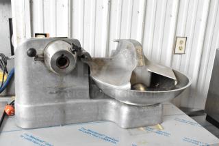 Hobart 84185 metal commercial countertop buffalo chopper, 115 volts, used condition, visible wear, sturdy construction.