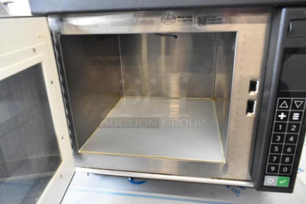 2021 Amana RC30S2 stainless steel commercial microwave oven, open door, key pad visible, slight wear, 208/240V.