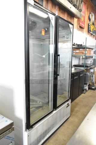 Master-Bilt BLG-48HD 2-door reach-in freezer merchandiser, metal frame, glass doors, clean interior, used condition.