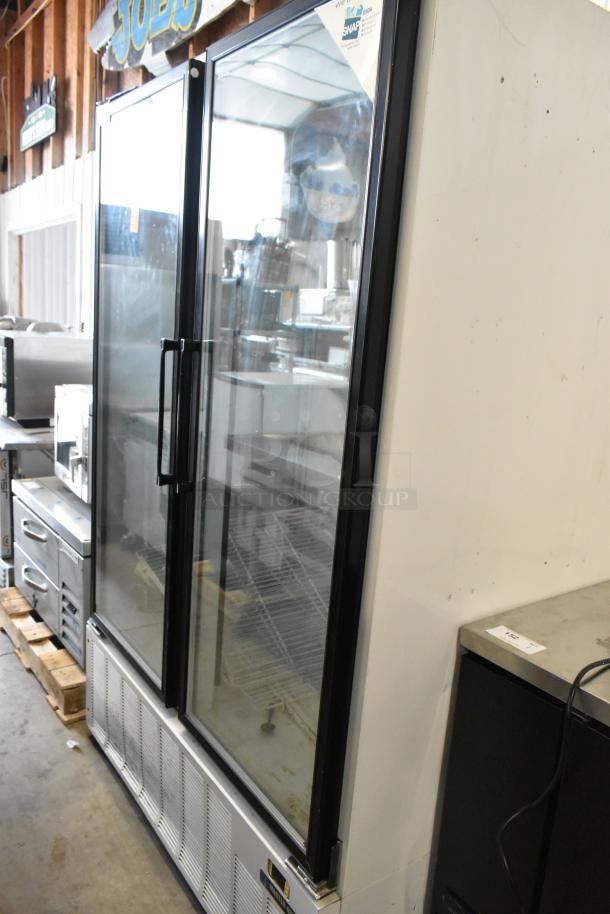 Master-Bilt BLG-48HD metal commercial 2 door reach-in freezer merchandiser, 115/208-230 volts, 1 phase, good condition.