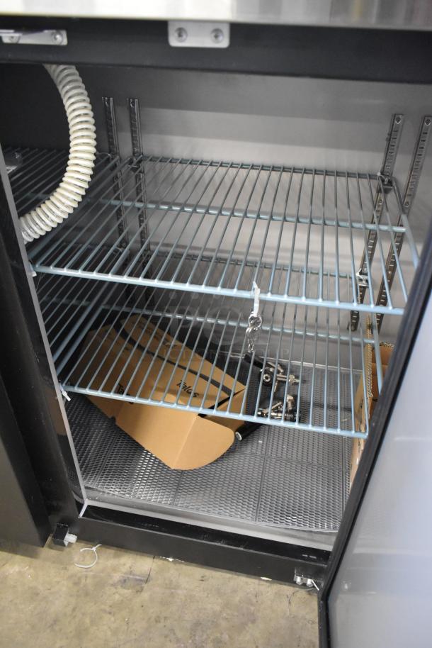 Brand new metal commercial direct draw kegerator. Visible shelving, coil tubing; 115 volts, 1 phase. Scratch and dent condition.