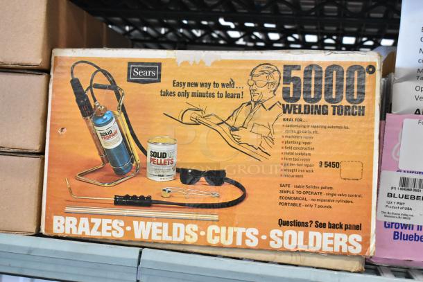 Sears 5000 Welding Torch box; includes Solidox pellets, goggles, and propane cylinder. Ideal for brazing and welding.