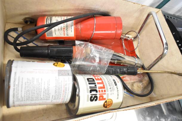 Sears 5000 Welding Torch with red canisters, hose, and accessories in a box. Includes solid pellet cans. Used condition.