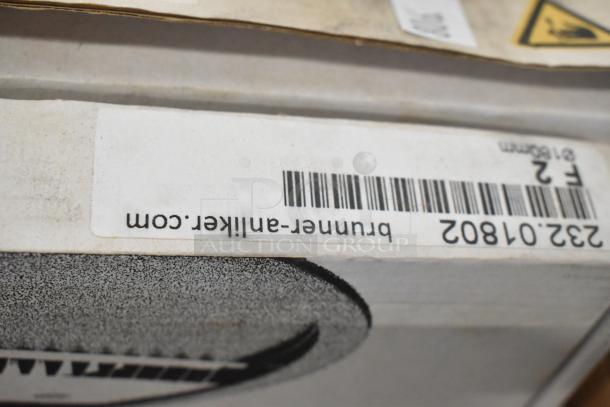 11 Brunner Anliker food processor blades, brand new in packaging, barcode 232.014802. Box and label details visible.