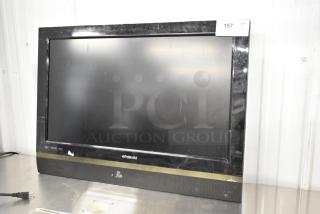 Polaroid 3211-TLXB TV in good condition, black frame, 100-240V, HDMI input, pickup only, tag shows item 157.