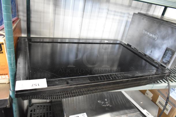 Polaroid 3211-TLXB Television, black, 100-240V, 1 Phase, shown on shelf. Dust present, must pick up, not shipped.