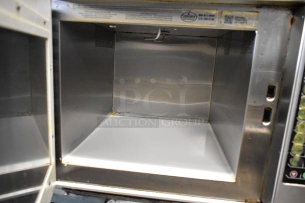 Menumaster MRC30S2 stainless steel commercial countertop microwave oven, open door, interior view, 208/240V, 1 Phase.