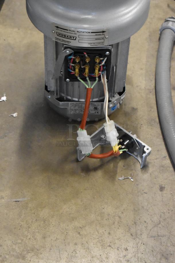 Hobart FD4/125-2 commercial garbage disposer with long upper housing, 1 1/4 hp, visible wiring, 208-240/480V.