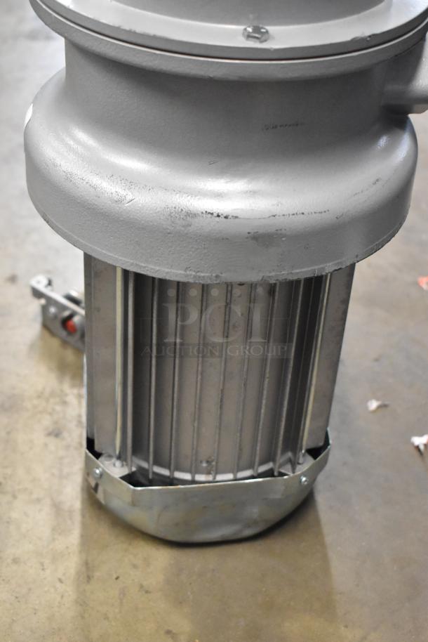Hobart FD4/125-2 commercial garbage disposer, 1 1/4 hp, long upper housing, 208-240/480V. Visible wear, industrial use.