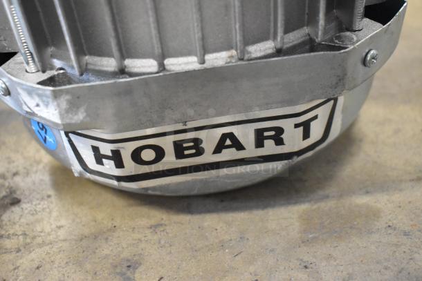 Hobart FD4/125-2 garbage disposer, 1 1/4 hp, 208-240/480V, with long upper housing, visible label.