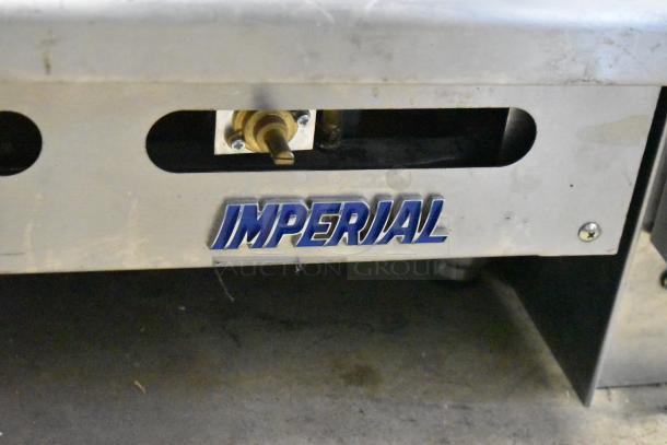 Imperial ITS-24 stainless steel countertop natural gas griddle, commercial use, branded logo visible, model ITS-24.